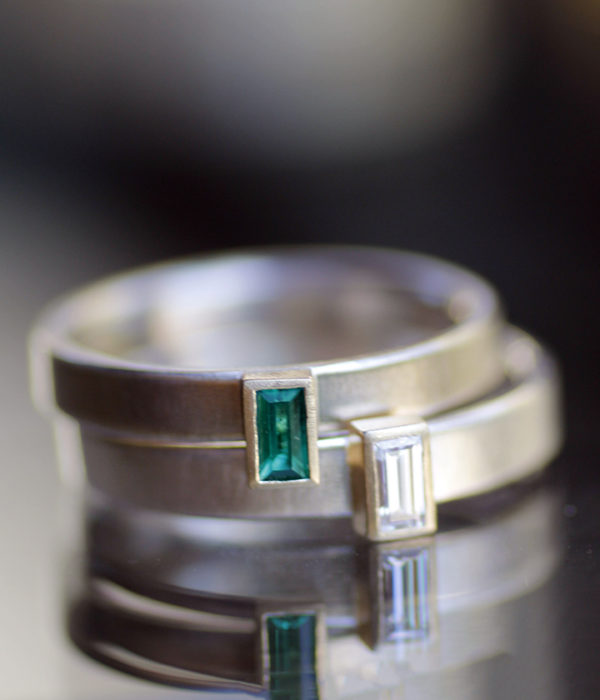 chatham emerald or moissanite baguette in bezel centered or off center