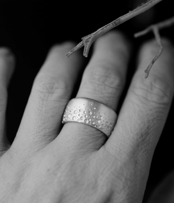seafoamseafoamwidebandweddingringonhand  scaled