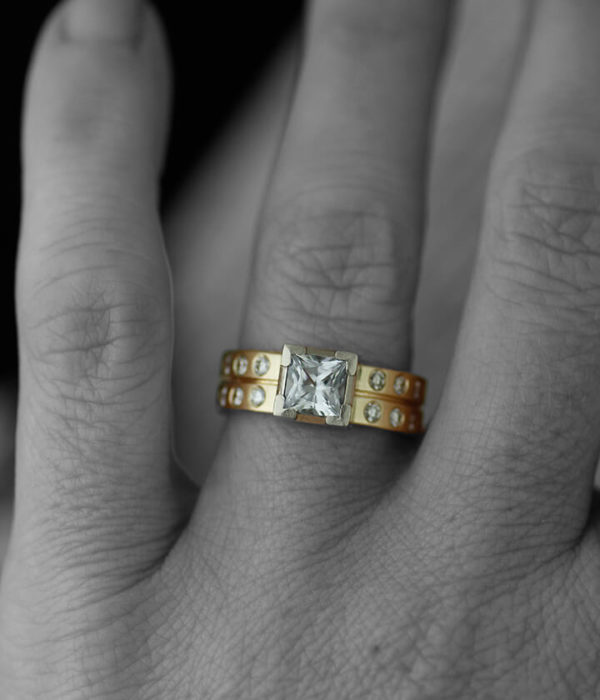 circle and square white sapphir on hand