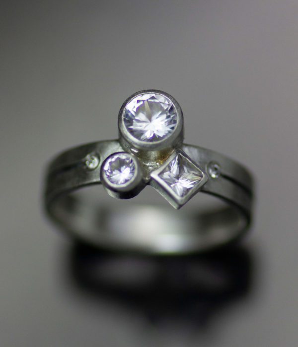 white sapphire ice storm ring