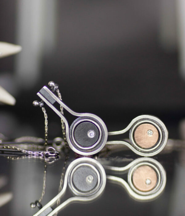 rose gold and oxidized meteorite pendant