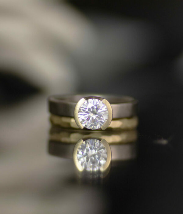 moissanite half bezel faceted set
