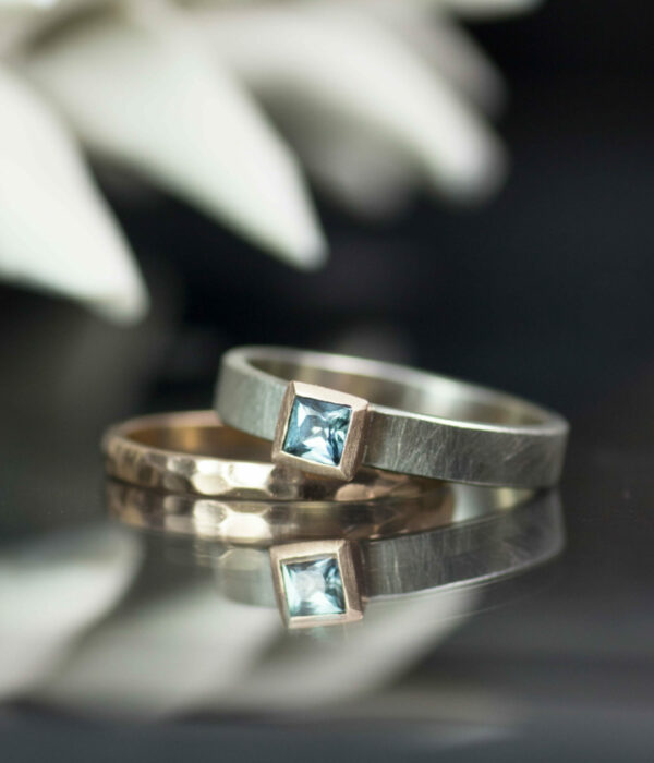 teal square sapphire with faceted band