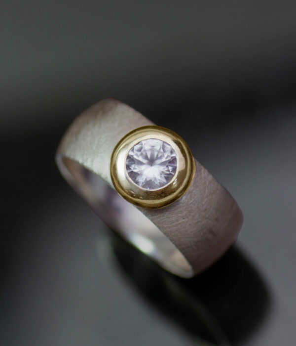 two textures sapphire band in white and yellow gold