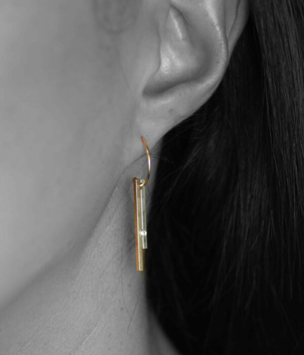 fused bar with diamond mini hoops on model