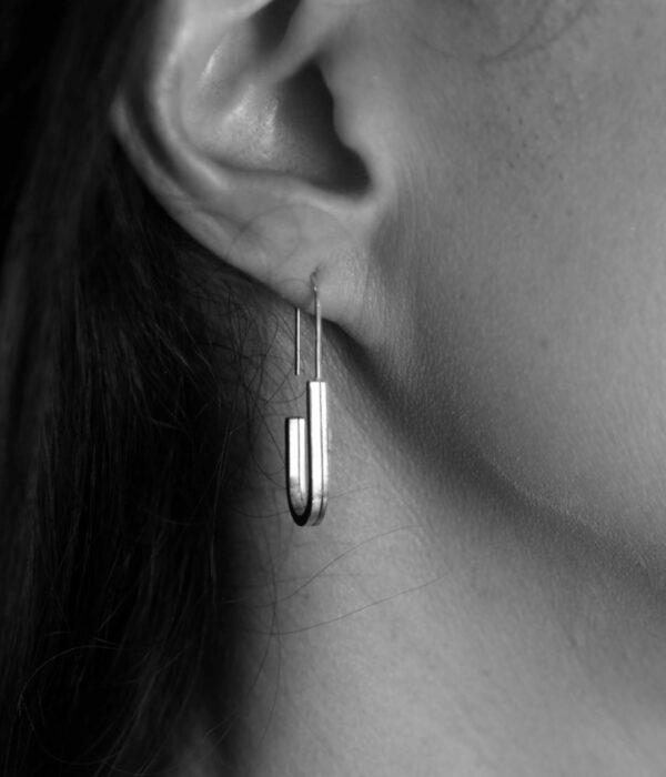 racing stripes earrings on model