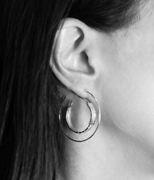 textured backward loop hoops on model