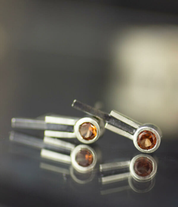 double stripe pad round sapphire studs