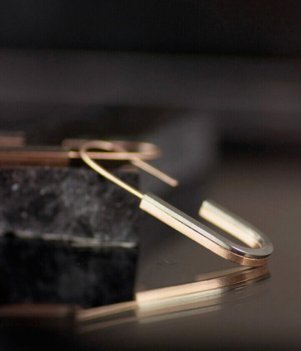 racing stripes earrings close up