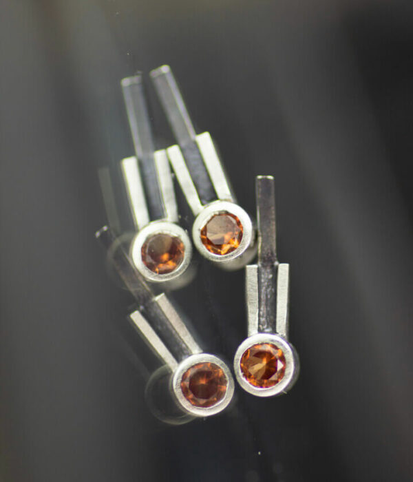 round pad sapphire stud earrings