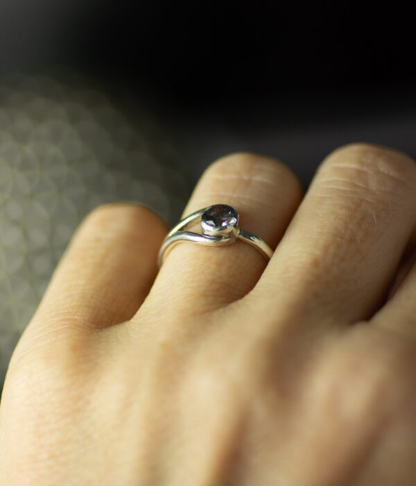 salt and pepper diamond double orbit platinum soliataire on hand