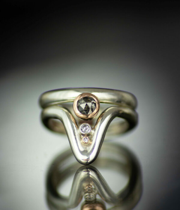 deep wave bezel salt and pepper rose cut diamond platinum and 14K rose gold wedding set