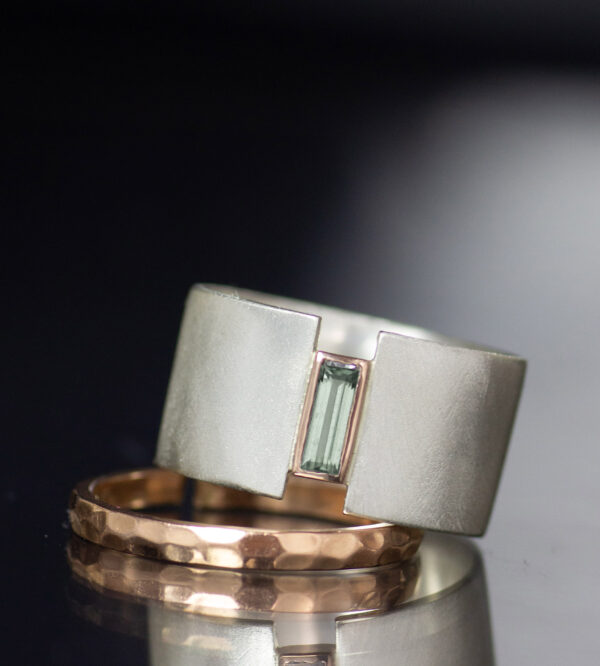 baguette lunar eclipse wide band alternative engagement ring in platinum and 14K rose gold