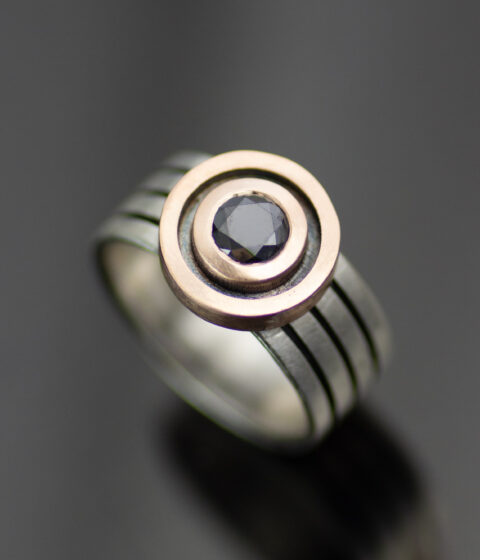 Main Black And Rose Gold Intersecting Orbits Wide Band Engagement Ring Scaled