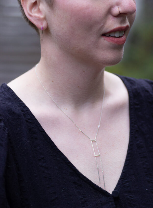 Model 2 Stelring Silver Kinetic Lines Necklace 1 Scaled