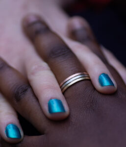 Gold Stripe Tri Color 14k Gold Holding Hand Gender Neutral Wedding Band 2 Scaled