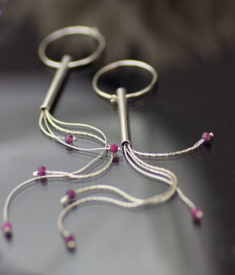Sterling silver & ruby or sapphire gemstone dangly earrings, with a jellyfish inspired design.